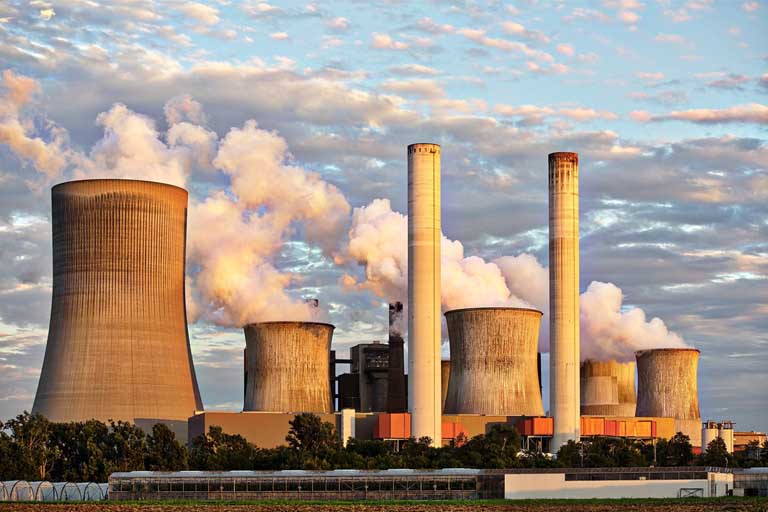 Several factories polluting the air with white smoke
